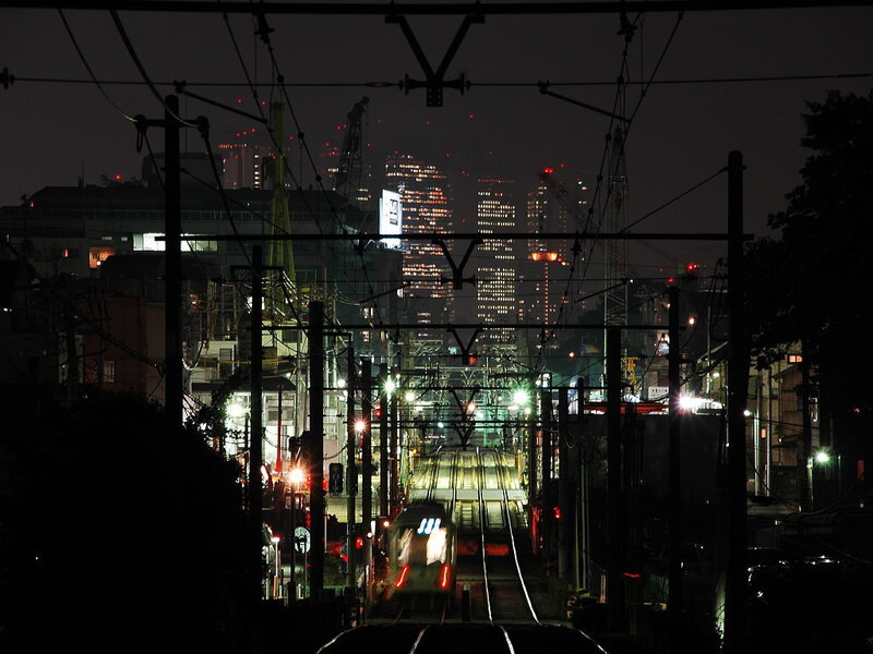Night train in urban landscape