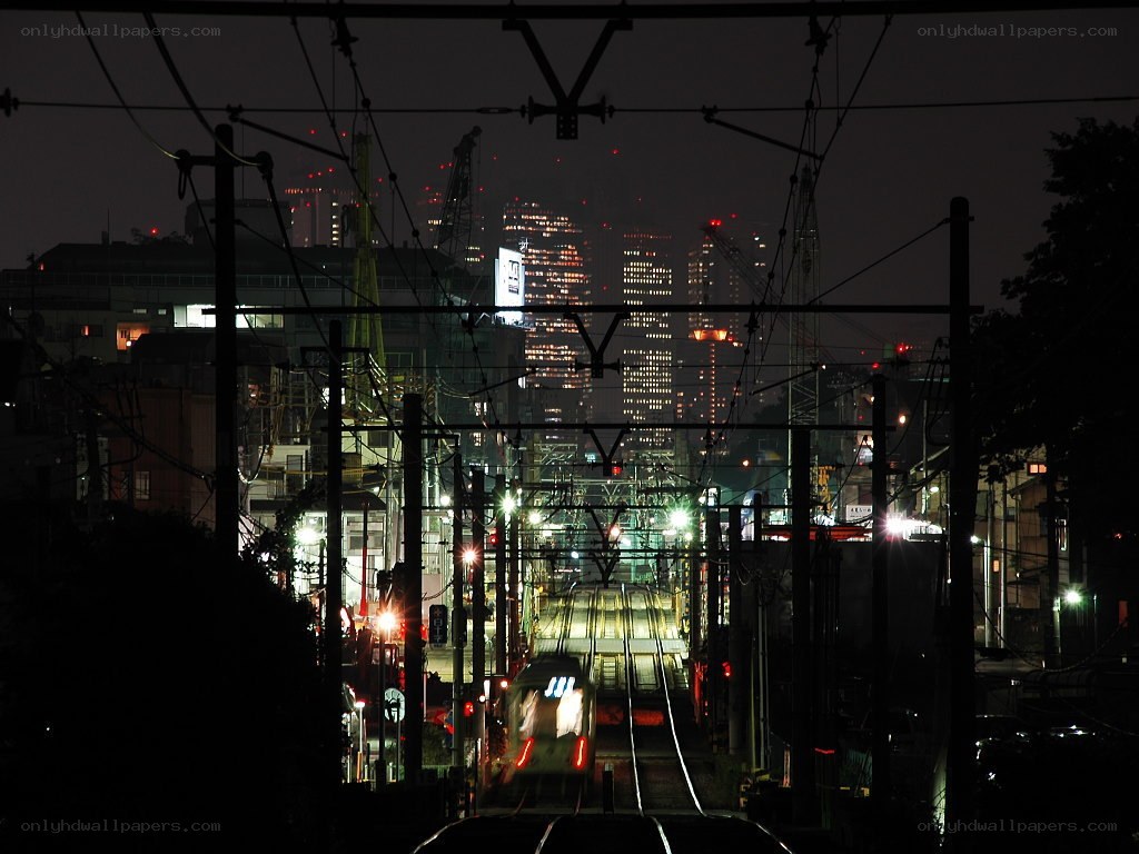 Night train in urban landscape