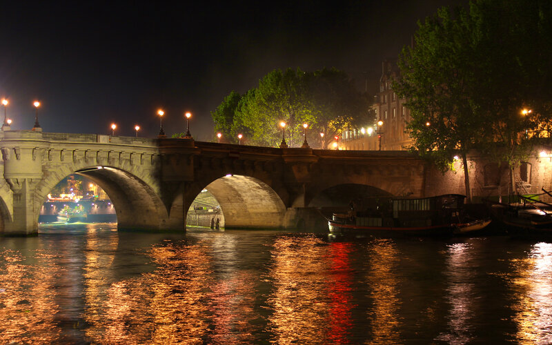 night view of a bridge over river
