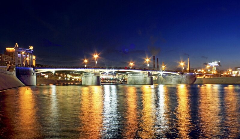 night view of a bridge over river
