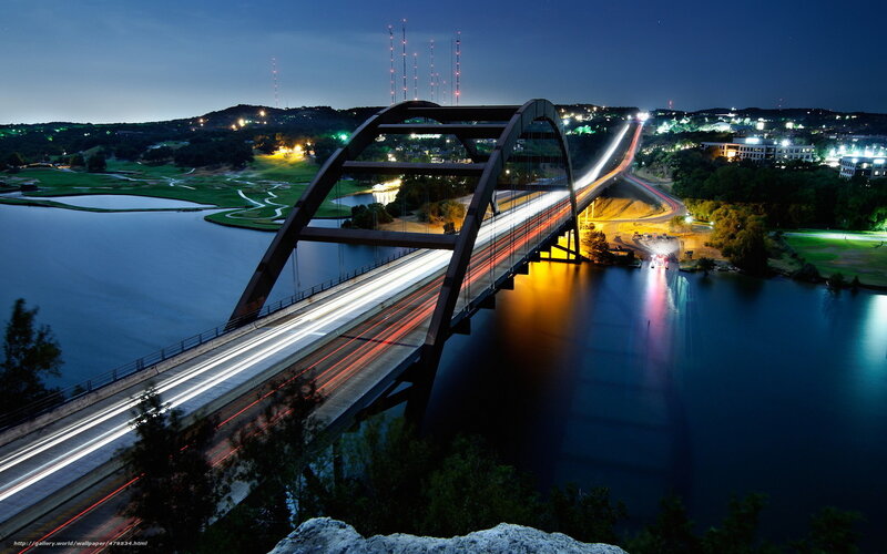Night view of a bridge over water