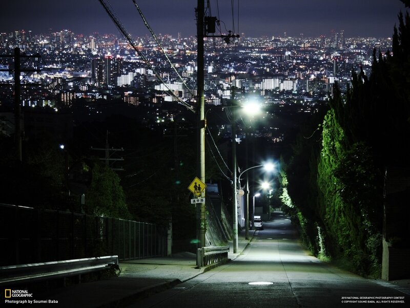 Night view of a city from a hill