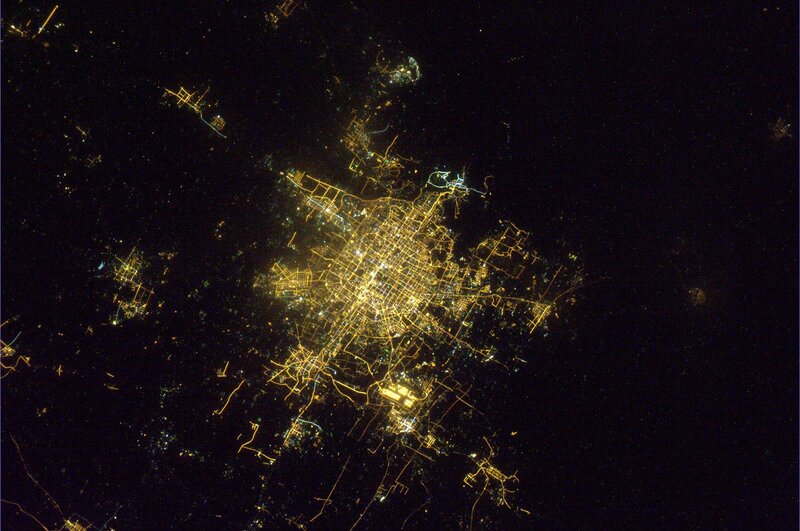 Night view of a city from space