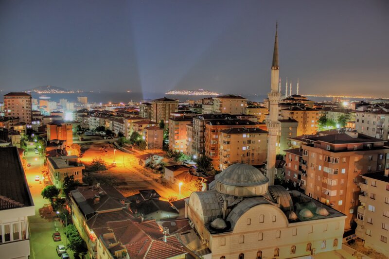 Night view of a city with mosque