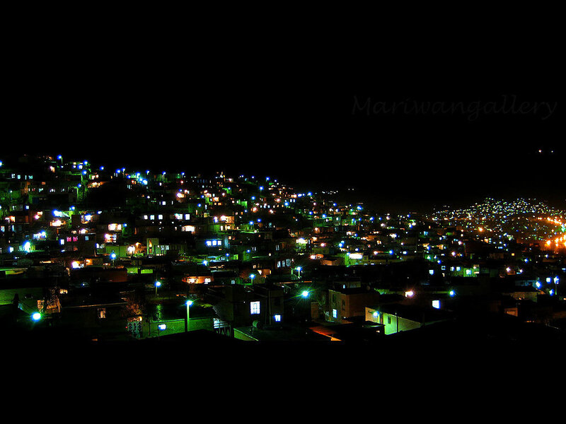 night view of a hillside town