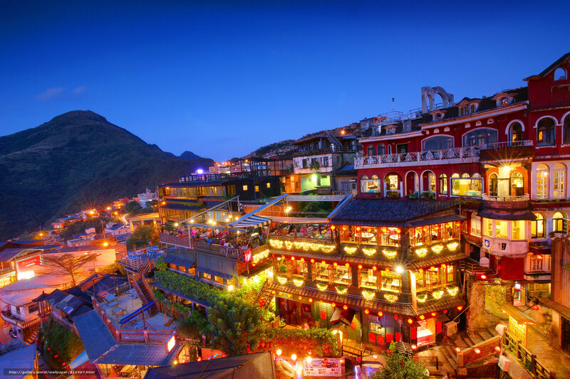 Night view of a hillside town