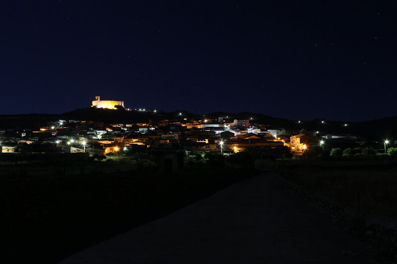 night view of a hilltop village
