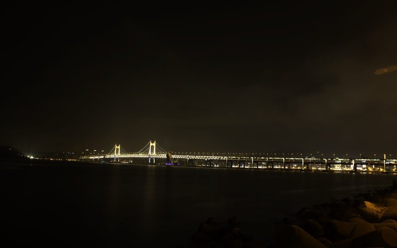 night view of a lit bridge