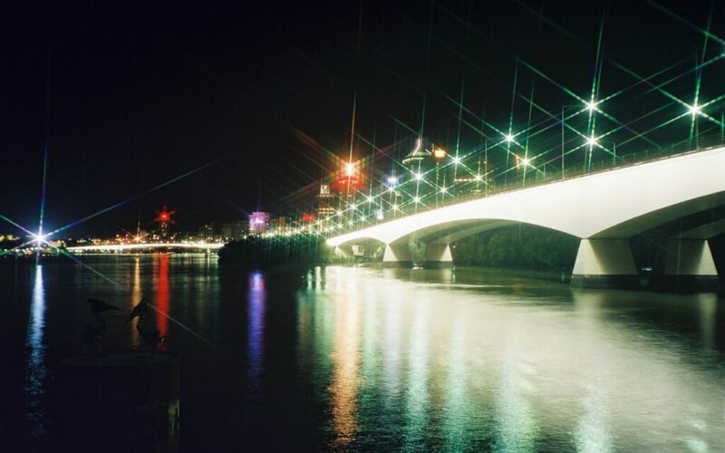 Night view of a lit bridge