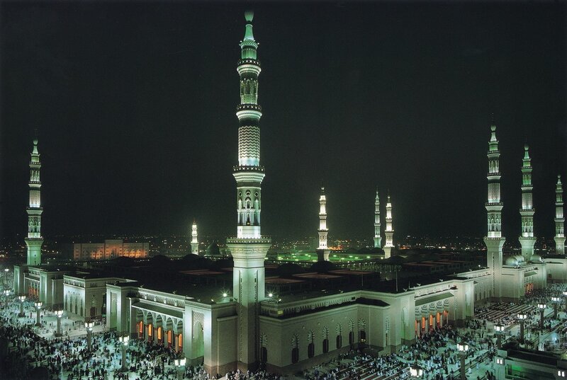 Night view of a mosque with minarets