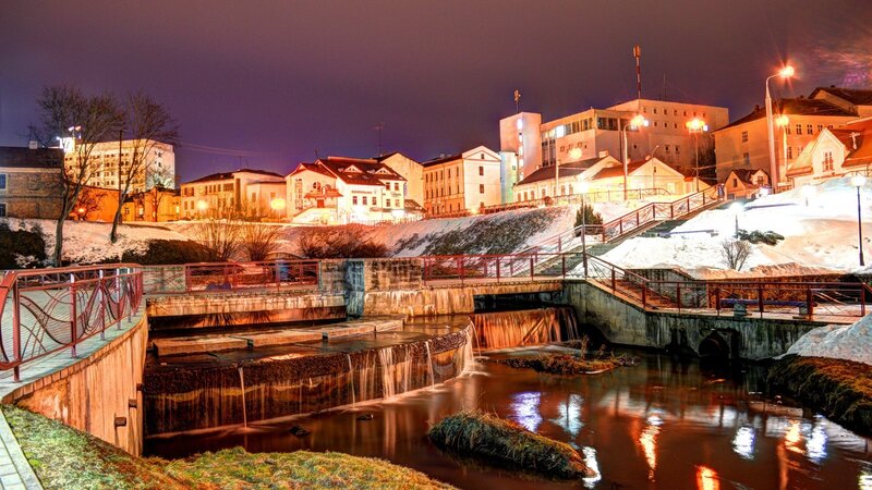Night view of a river in a town