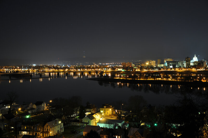 night view of city across river