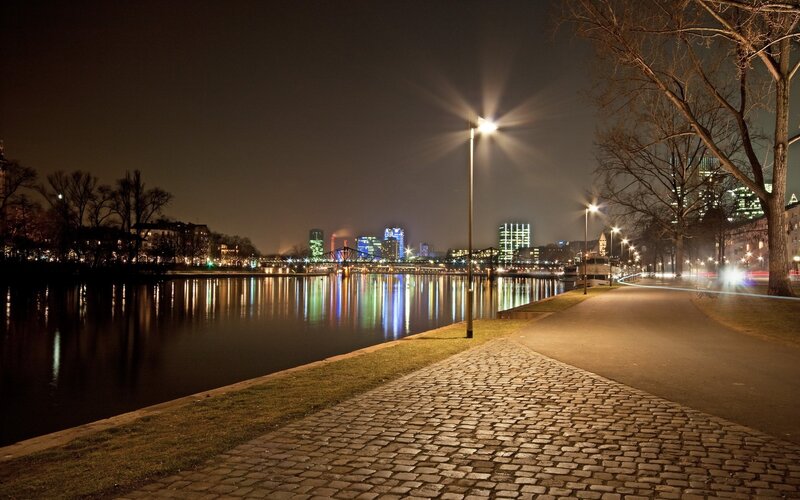 night view of city by river