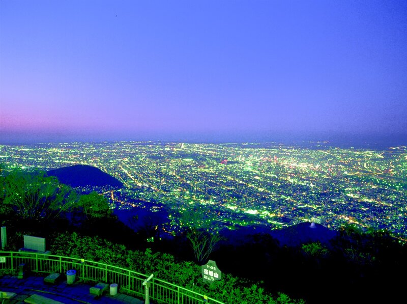 night view of city from mountain