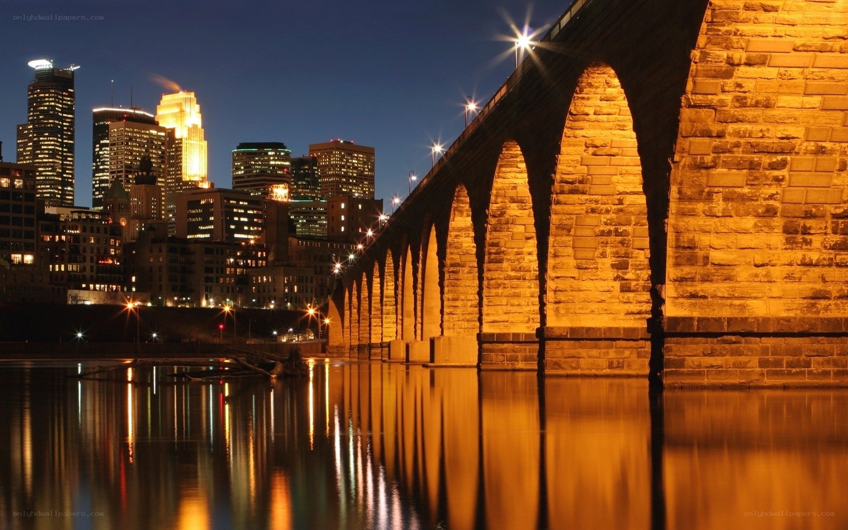 Night view of city skyline and bridge