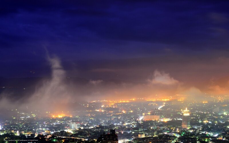 night view of city with clouds
