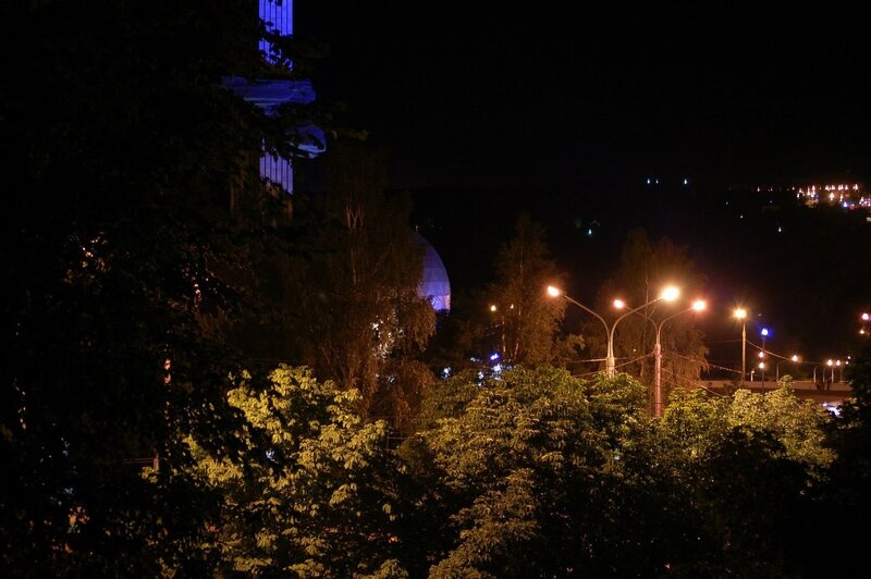 Night view of city with illuminated buildings