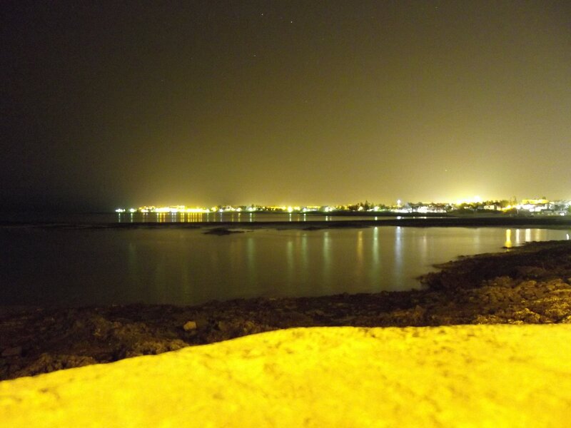 night view of coastal town
