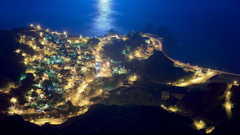 night view of coastal village