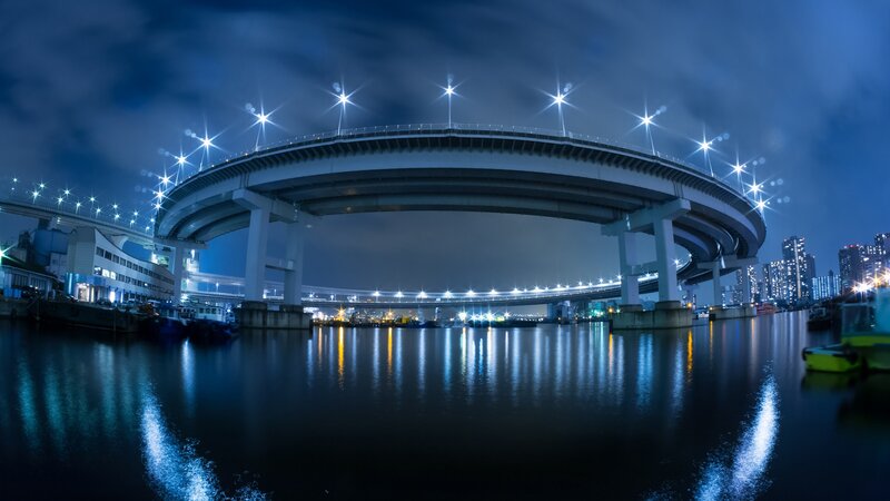 Night view of curved bridge