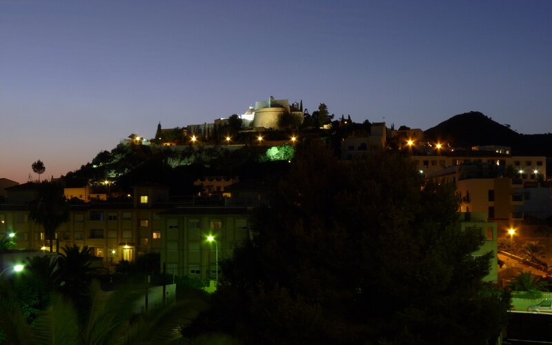 night view of hilltop town