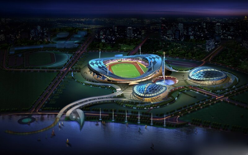 Night view of modern stadium complex