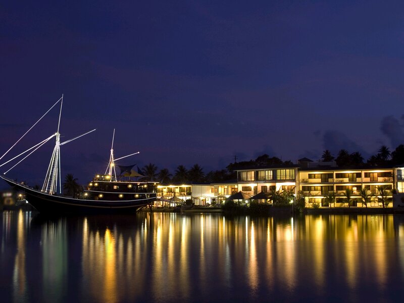 Night view of resort and boat