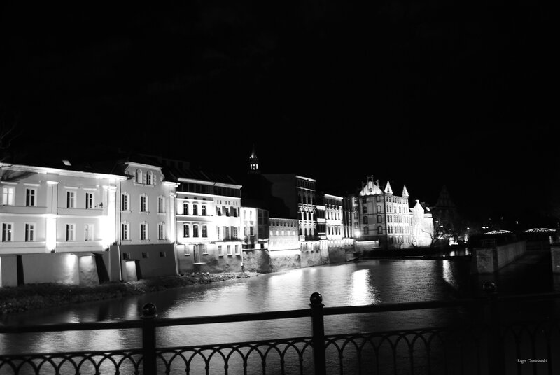 night view of river and buildings