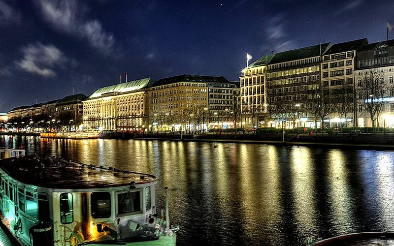 night view of river and buildings