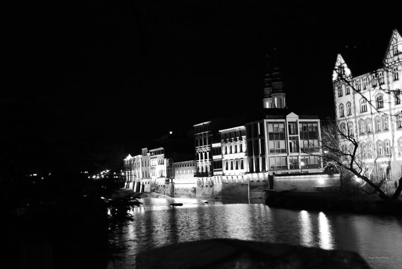 night view of river and buildings