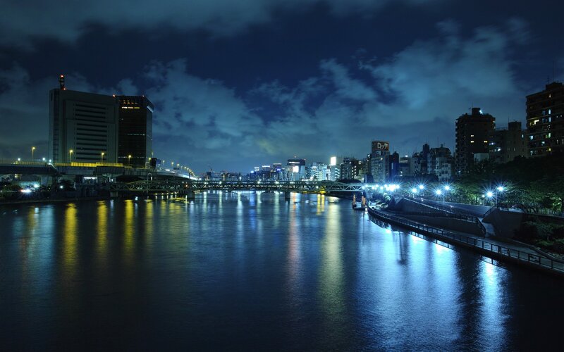 night view of river and city