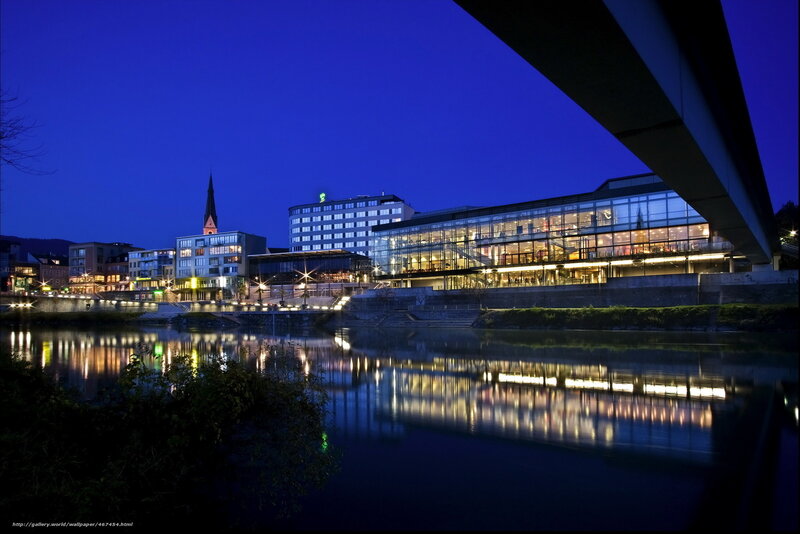 Night view of riverfront buildings