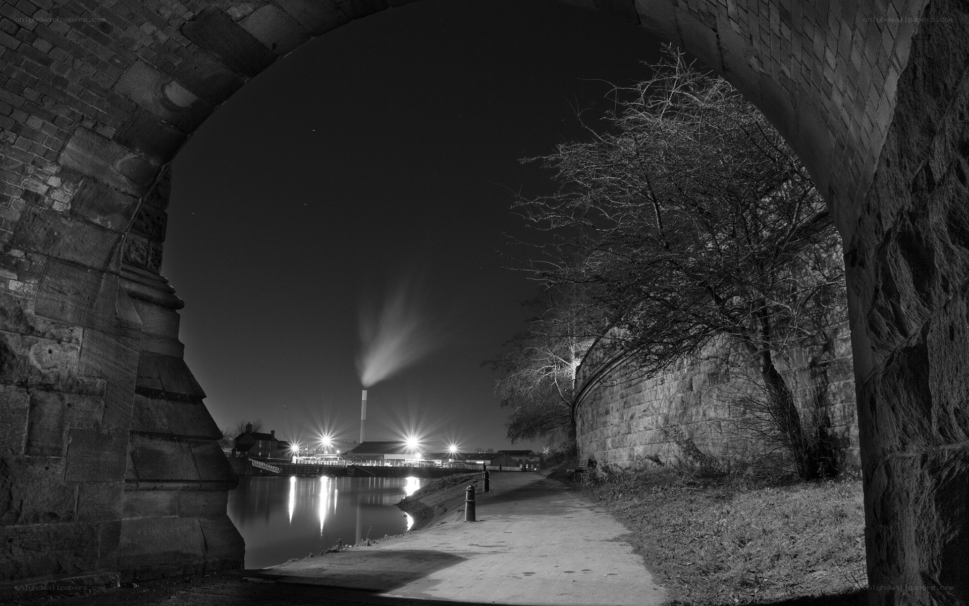 Night view through a stone arch