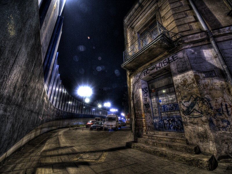 nighttime alley with graffiti