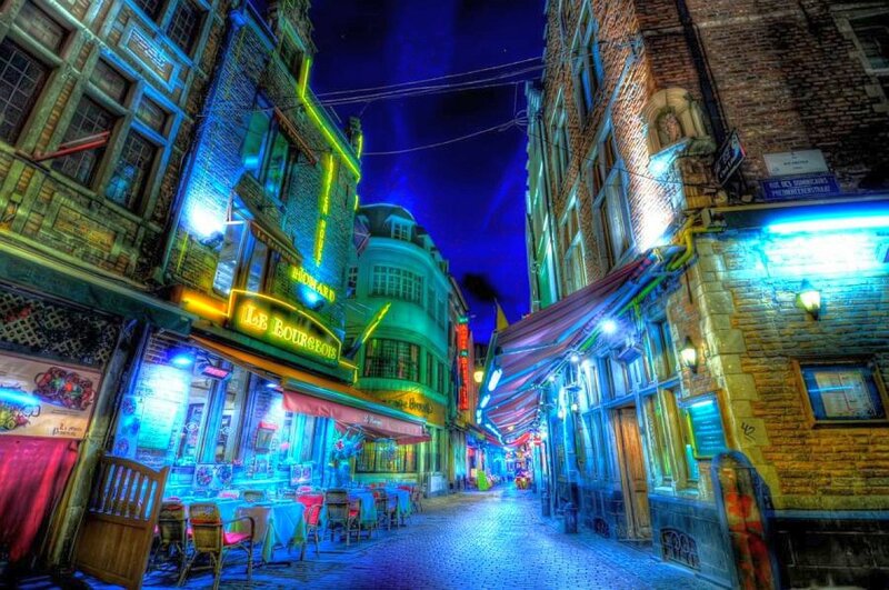 nighttime alley with neon lights