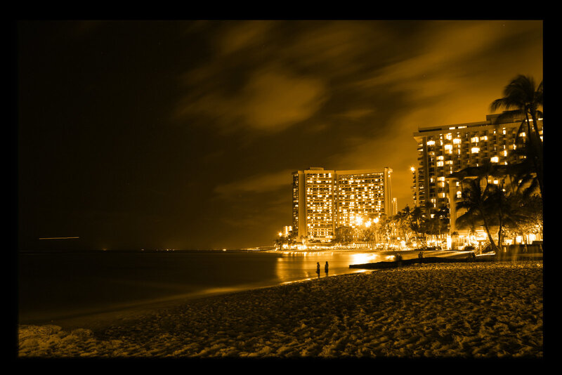 Nighttime beach with hotels