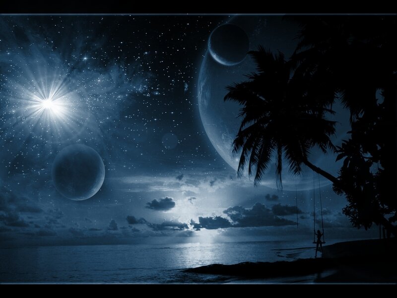 Nighttime beach with multiple moons