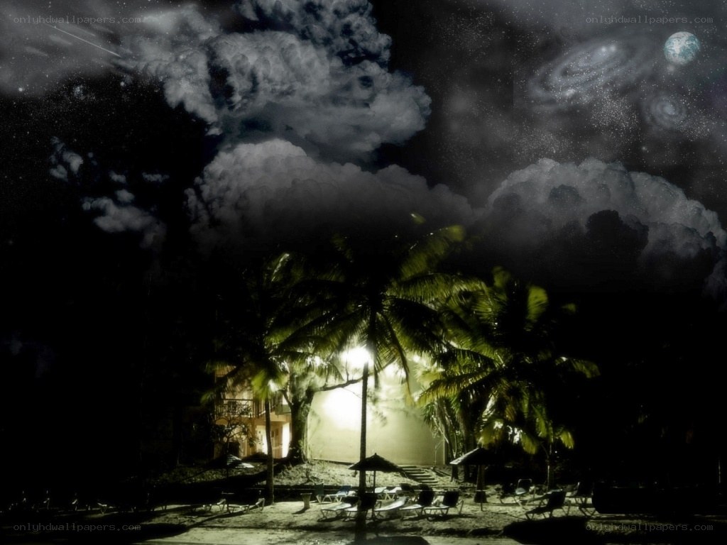 Nighttime beach with surreal sky