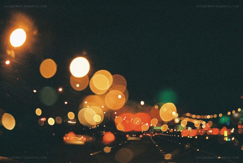 nighttime bokeh lights on highway