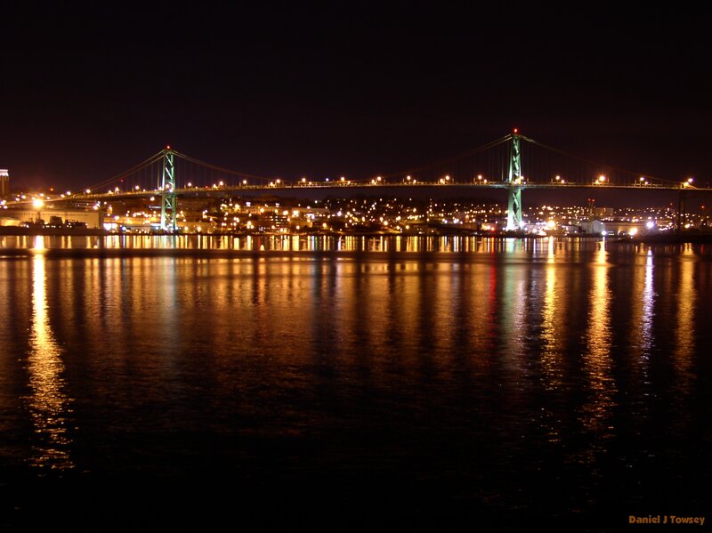 nighttime bridge over water