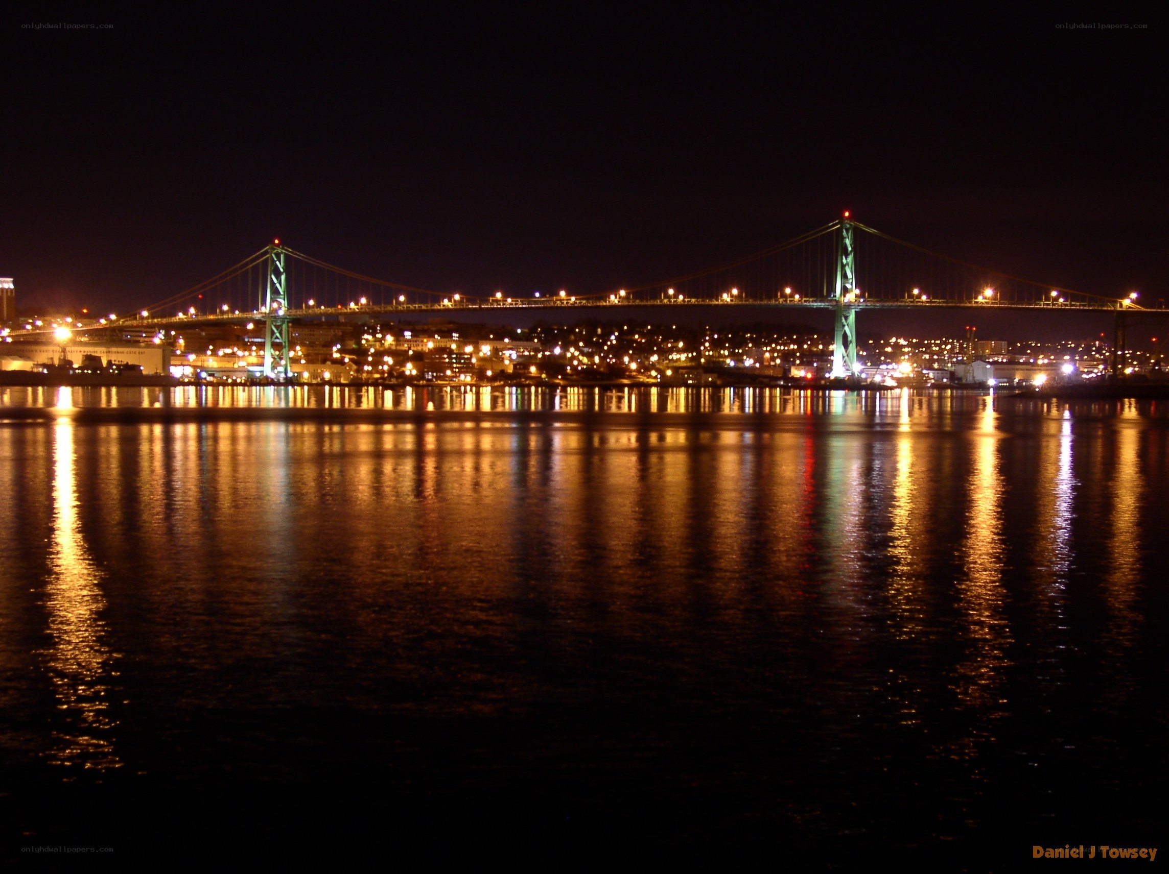 nighttime bridge over water