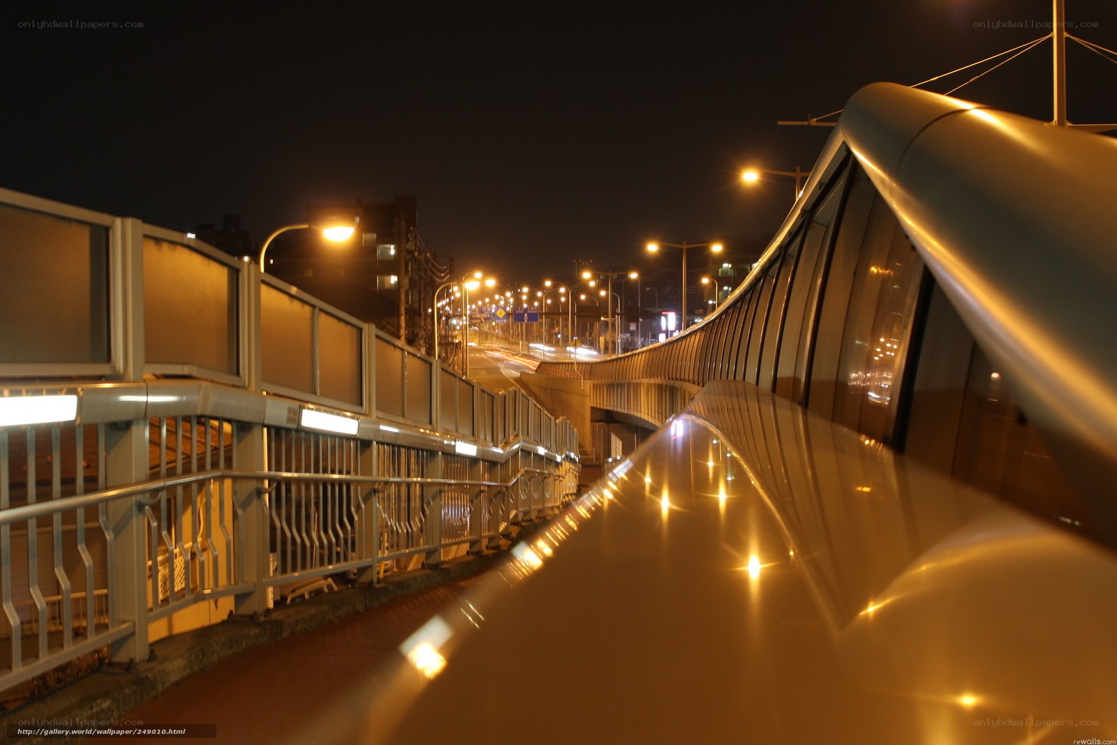 Nighttime bridge walkway