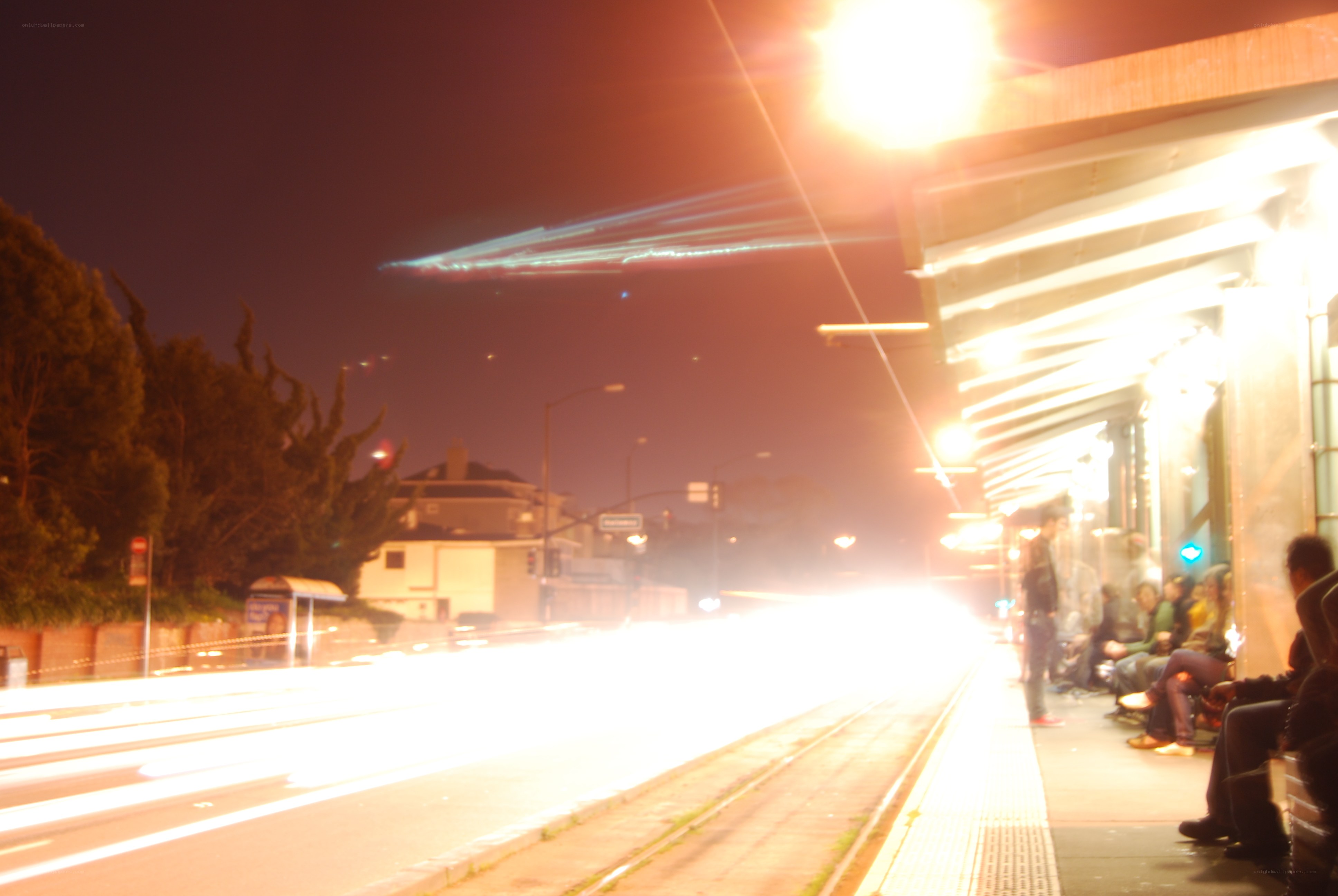 nighttime bus stop scene