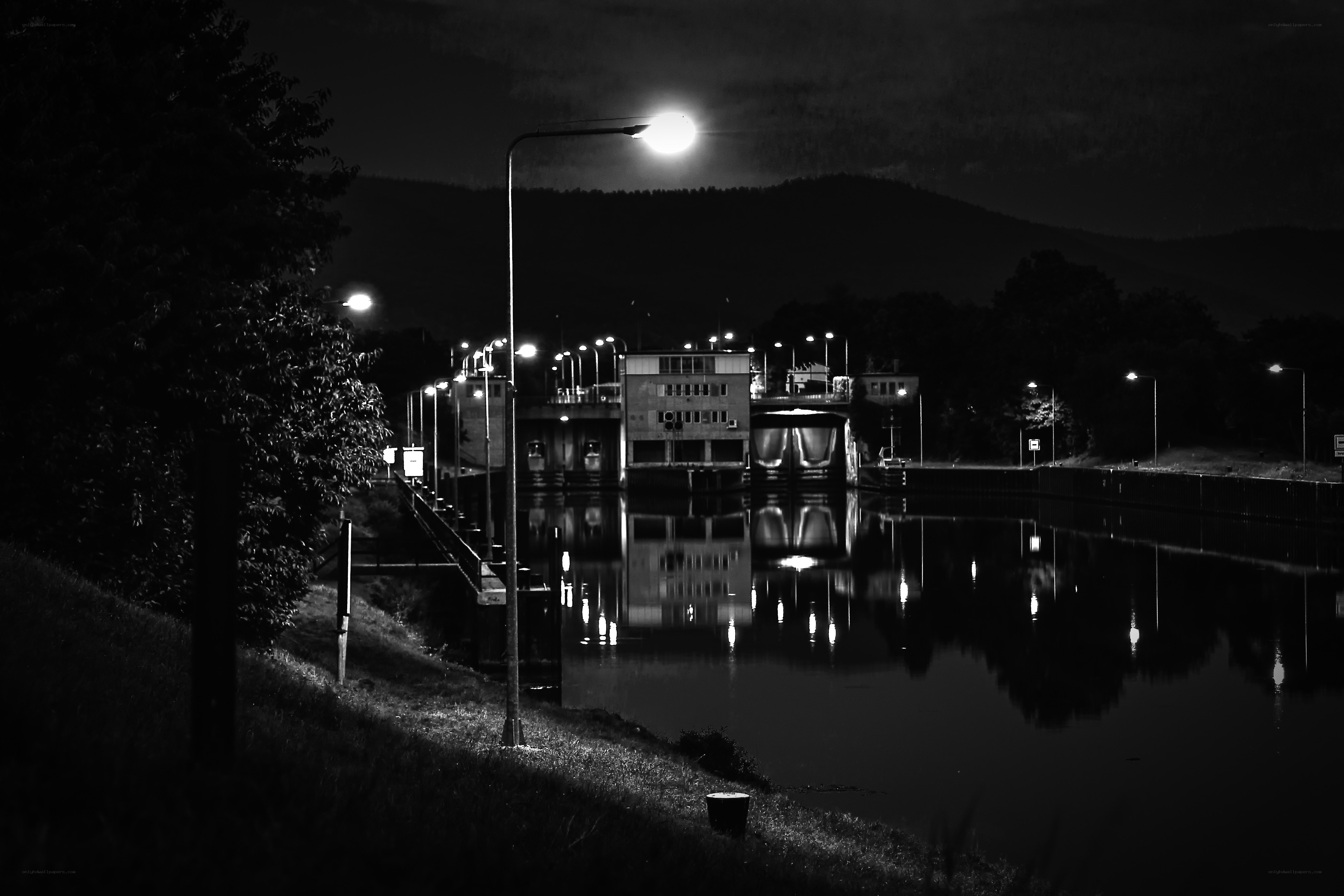 Nighttime canal lock scene