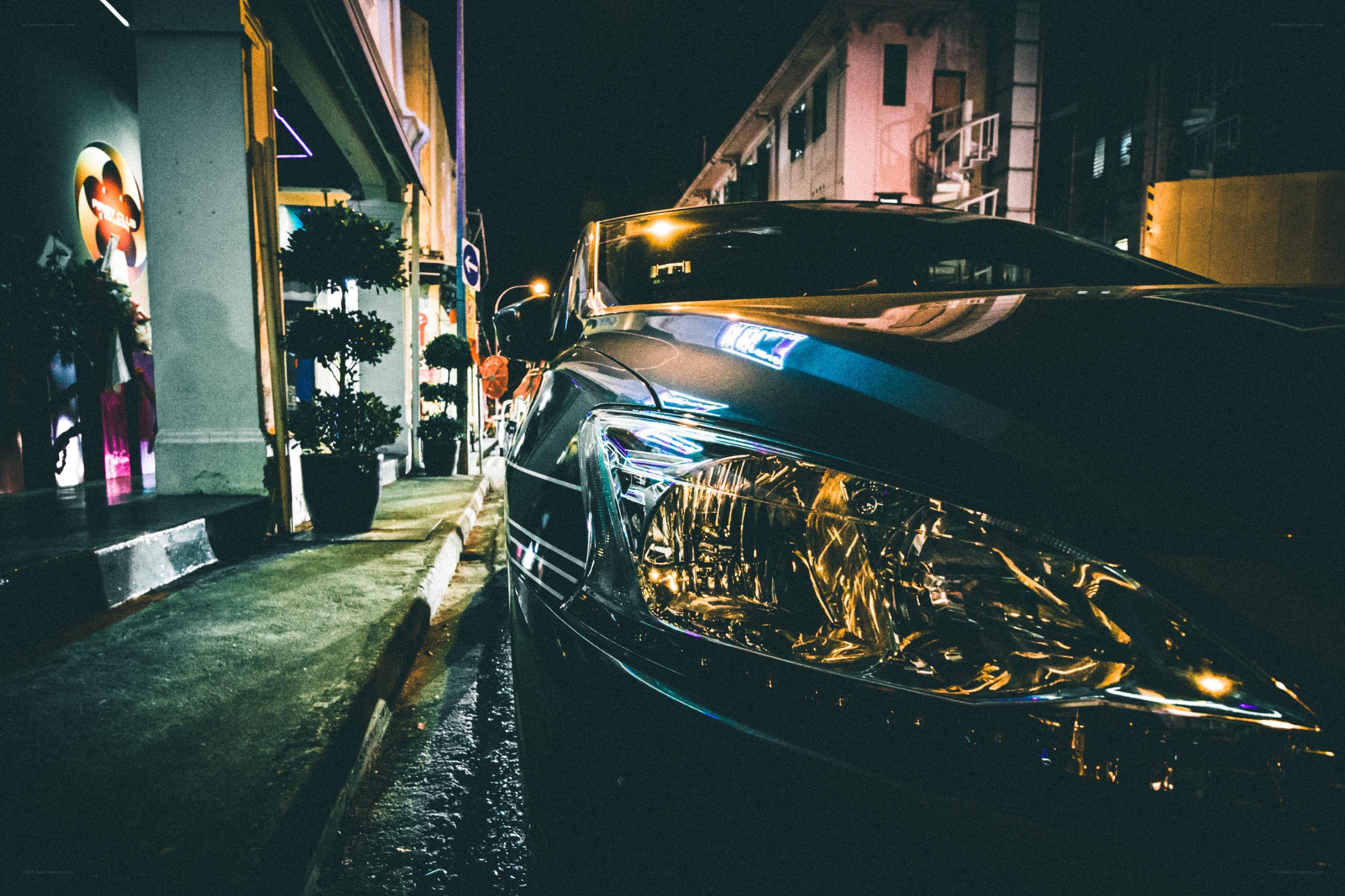 Nighttime car on a city street