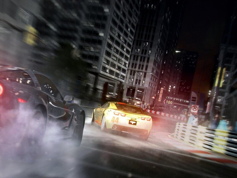 Nighttime car race in city