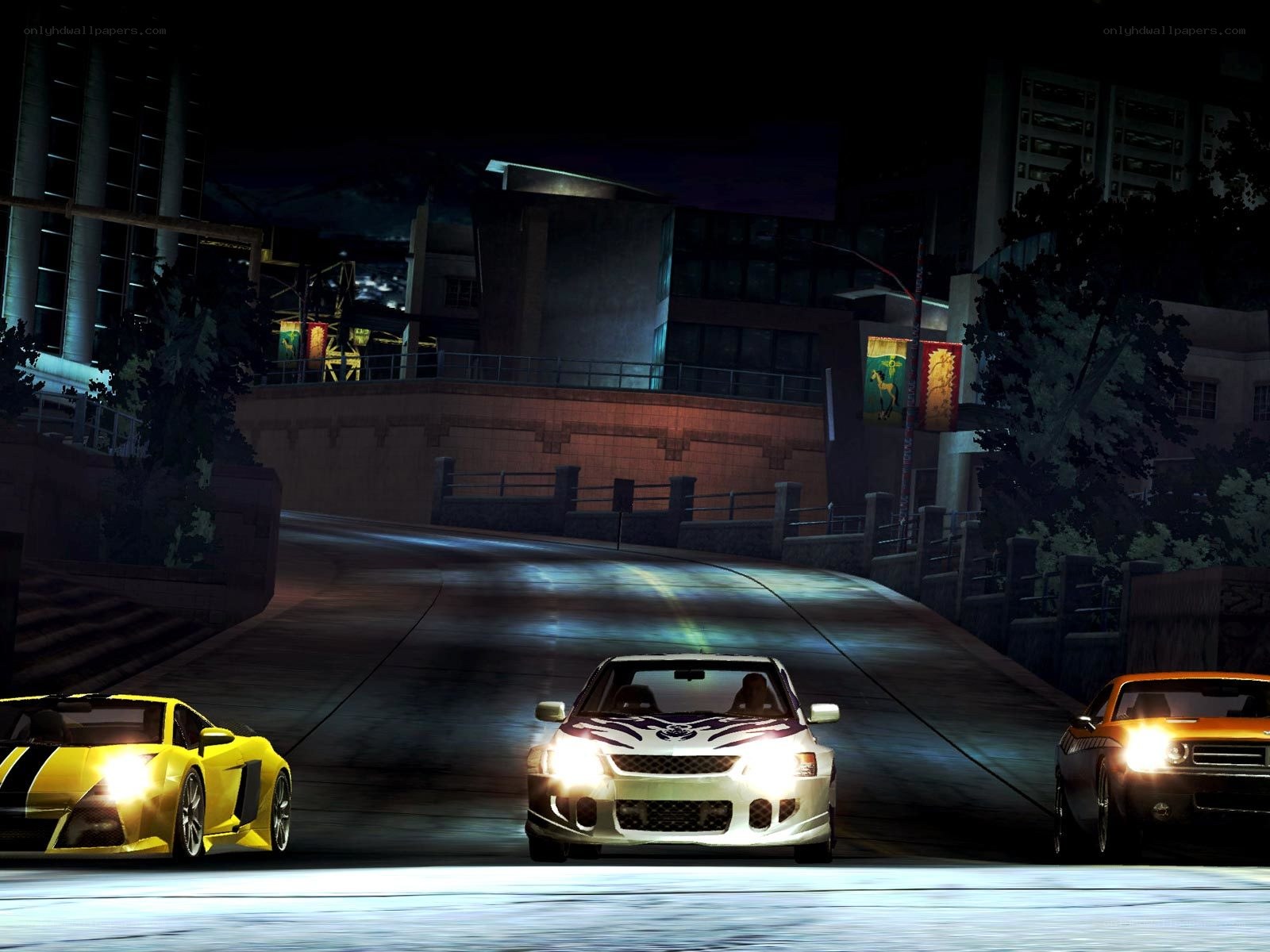 Nighttime car race in city