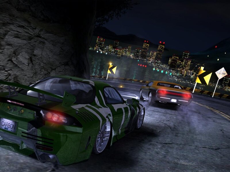 Nighttime car race on coastal road