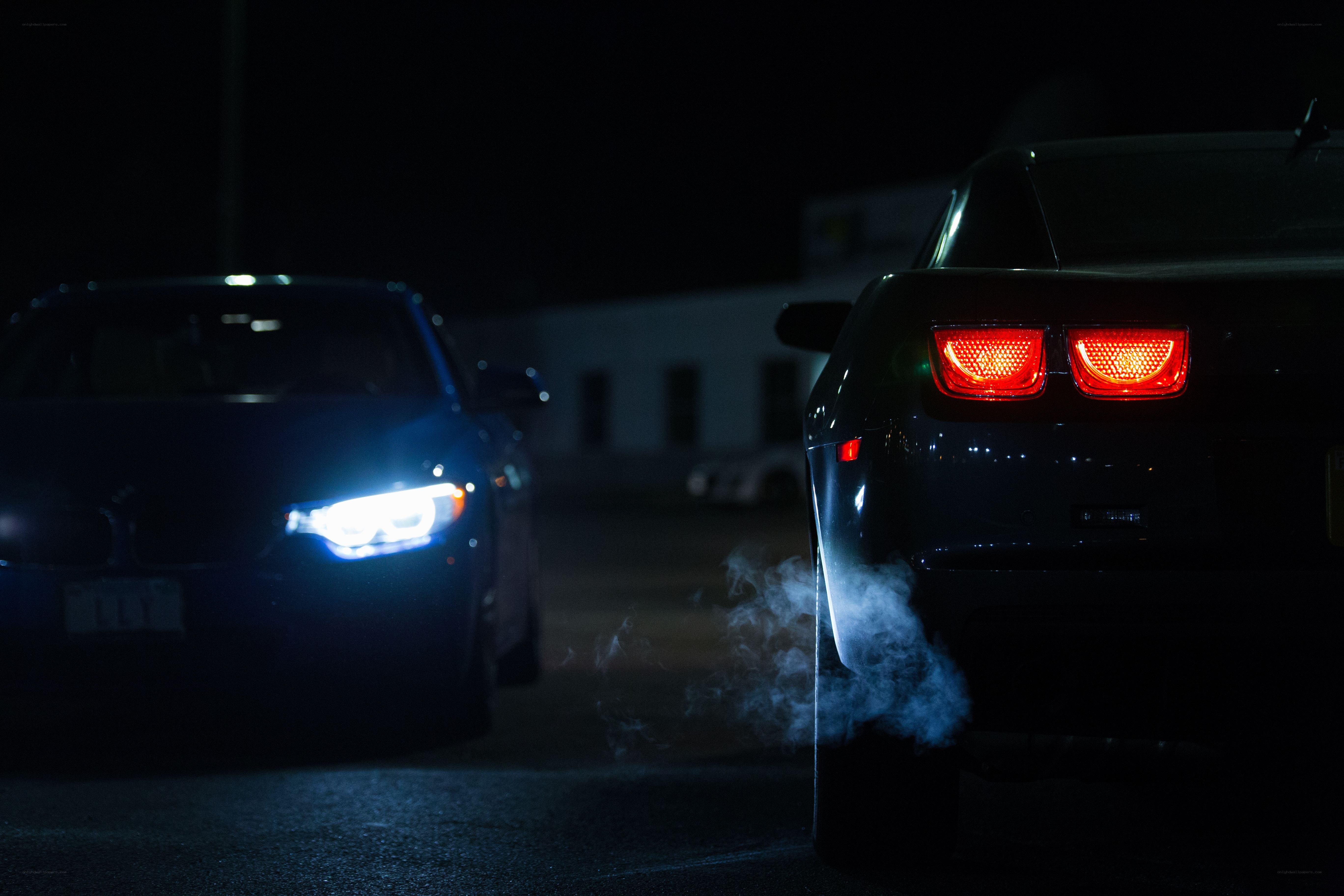 Nighttime car scene with exhaust