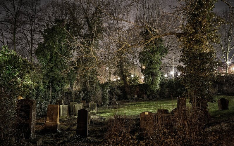 nighttime cemetery scene